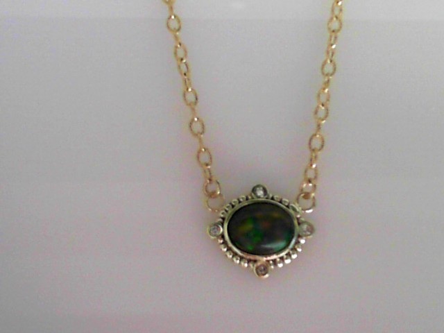 14K GREEN GOLD 3.5CT OVAL BEZEL SET BLACK OPAL PENDANT WITH .08CTTW ROUND SI CLARITY & G COLOR BEZEL SET DIAMONDS ON AN 18" TEXTURED CHAIN