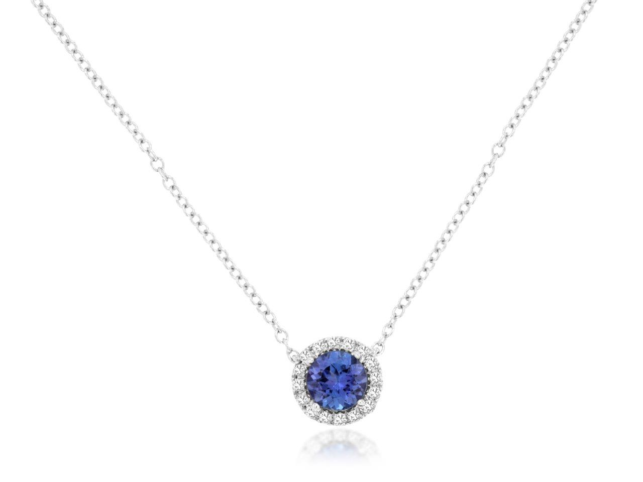 14K WHITE GOLD .50CT ROUND TANZANITE PENDANT WITH .10CTTW ROUND I1 CLARITY & HI COLOR DIAMONDS SET IN THE HALO ON A PENDANT CHAIN