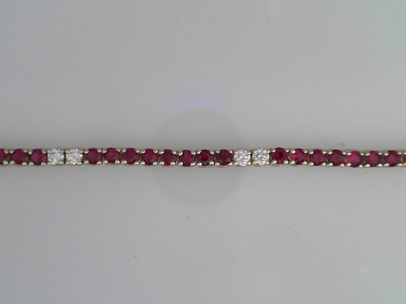 14K YELLOW GOLD IN LINE BRACELET WITH 3.08CTTW ROUND RUBIES AND .78CTTW ROUND SI CLARITY & G COLOR DIAMONDS SET IN GROUPS OF TWO