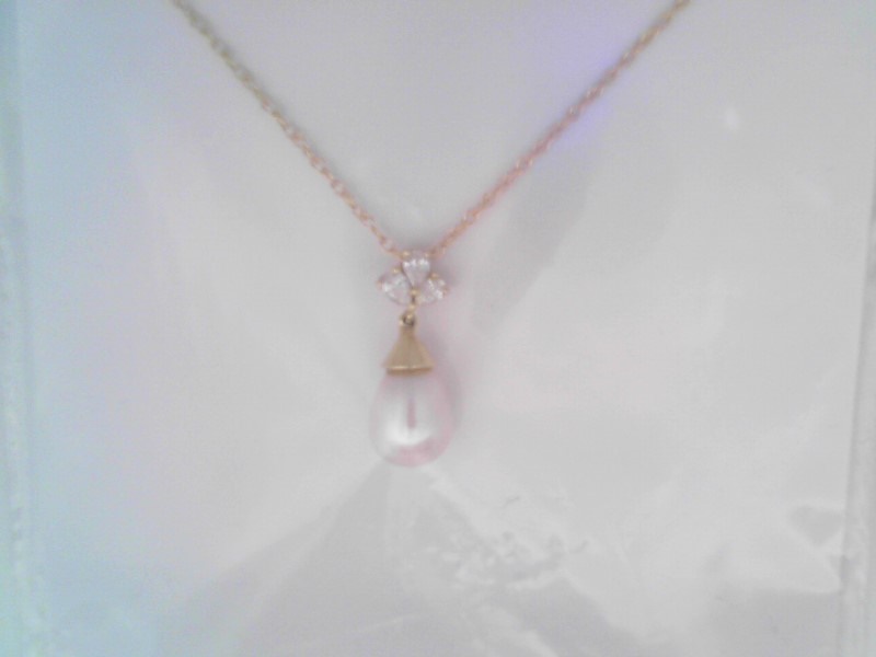 14K YELLOW GOLD PEARL DROP PENDANT WITH .15CTTW I1 CLARITY & HI COLOR PEAR SHAPED DIAMONDS SET IN THE BAIL ON A PENDANT CHAIN