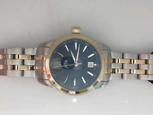 LADY'S TWO TONE CASE AND BRACELET ROUND TEXTURED BLACK DIAL FOX WATCH WITH THE DATE