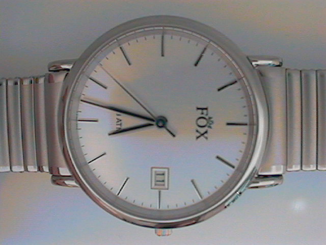 GENTS STAINLESS STEEL ROUND SILVER STICK DIAL WITH AN EXPANSION BAND FOX WATCH
