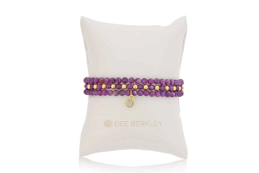 DEE BERKLEY - SET OF THREE: 4MM FACETED RUBY WITH GOLD FILLED FINISHING BEADS, 4MM FACETED RUBY & GOLD FILLED 1X1 & 4MM FACETED RUBY WITH GOLD PLATED SILVER CLEAR QUARTZ BEZEL CHARM