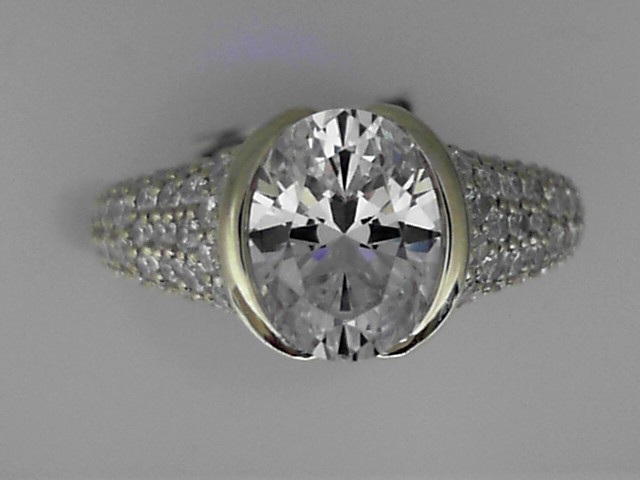 SILVER CZ SAMPLE HALF BEZEL SEMI MOUNTING WITH .96CTTW ROUNDS FOR A 2.5CT OVAL CENTER