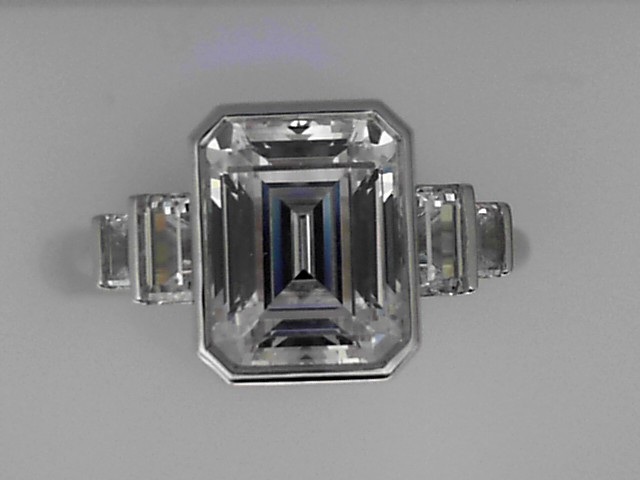 SILVER CZ SAMPLE BEZEL SETTING SEMI MOUNTING WITH .37CTTW BAGUETTE SIDES FOR A 2.5CT EMERALD CENTER