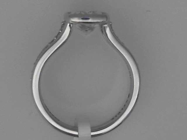 SILVER CZ SAMPLE BEZEL SET SEMI MOUNTING WITH.21CTTW ROUNDS SET IN THE CENTER OF THE TRIPLE TAPERED SHANK FOR A 2.5CT CUSHION CUT CENTER