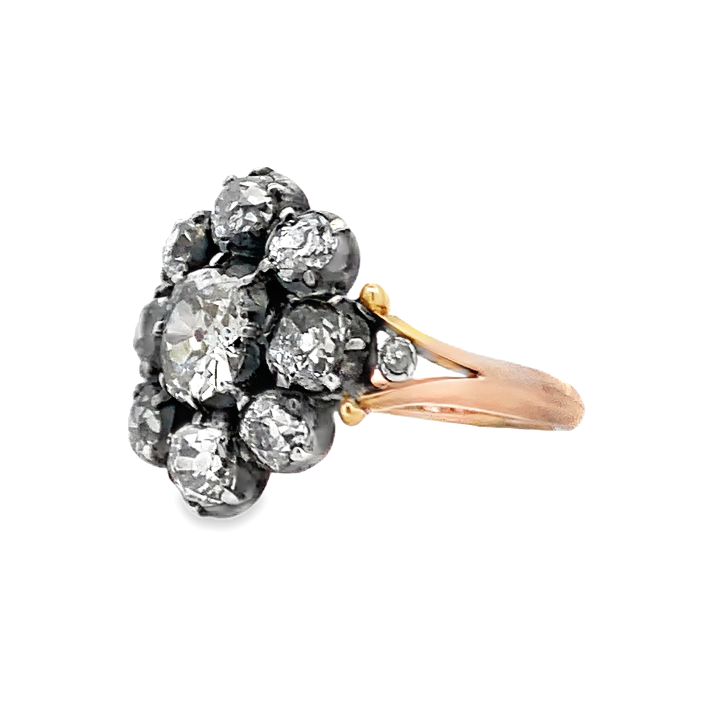 Antique Silver & 14K Yellow Gold Diamond Cluster Ring Size 6.75 with 1 Old Mine Cut Diamond Center 0.75 CTW H-L SI-I1 and 8 Old Mine Cut Diamonds 2.00 CTW H-L SI-I1 and 2 Single Cut Diamonds 0.02 CTW H-L SI-I1
3.4dwt