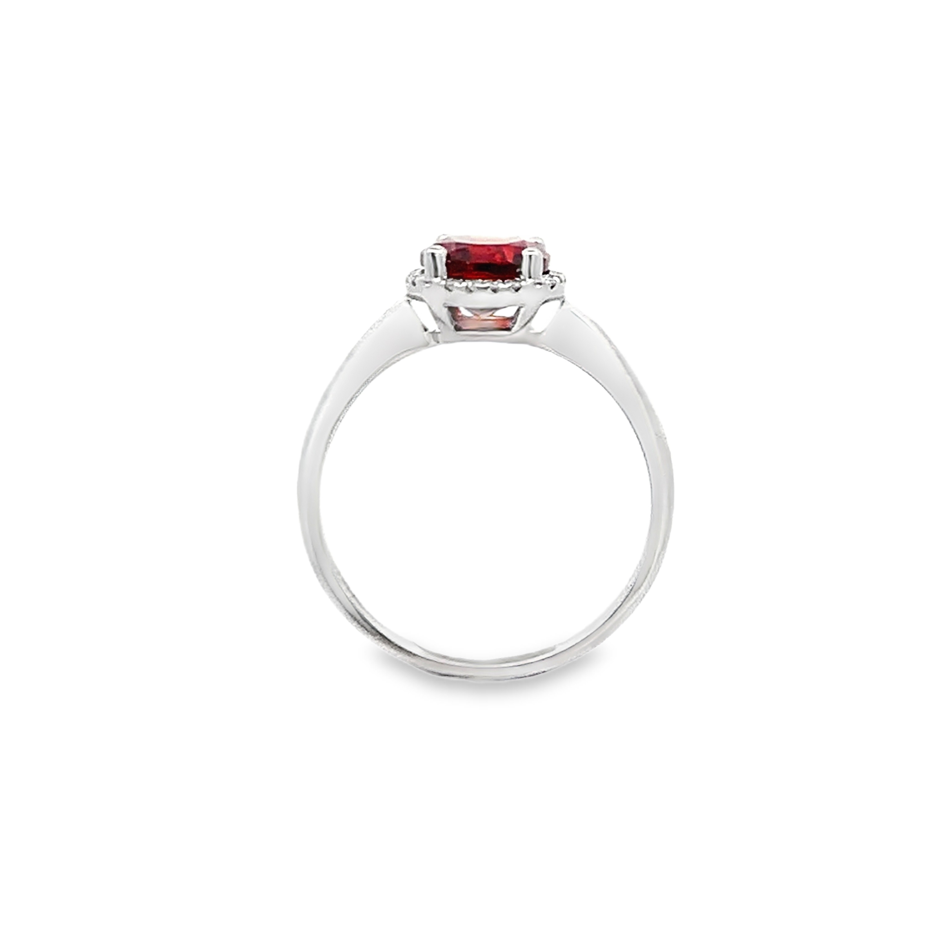 14K White Gold Oval Garnet and Diamond Halo Ring with 1 Oval Garnet 2.25 CTW and 20 Round Cut Diamonds 0.06 CTW H-I I1
Size 8