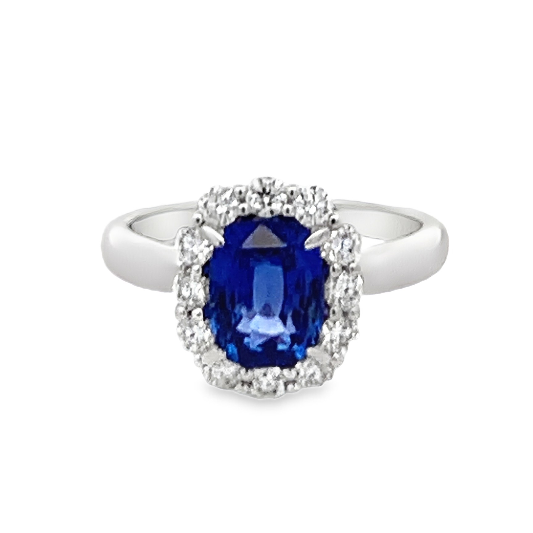 18K White Gold Sapphire and Diamond Halo Ring Size 6.25 with 1 Cushion Sapphire 2.70 CTW and 12 Round Cut Diamonds 0.56 CTW F-G VS