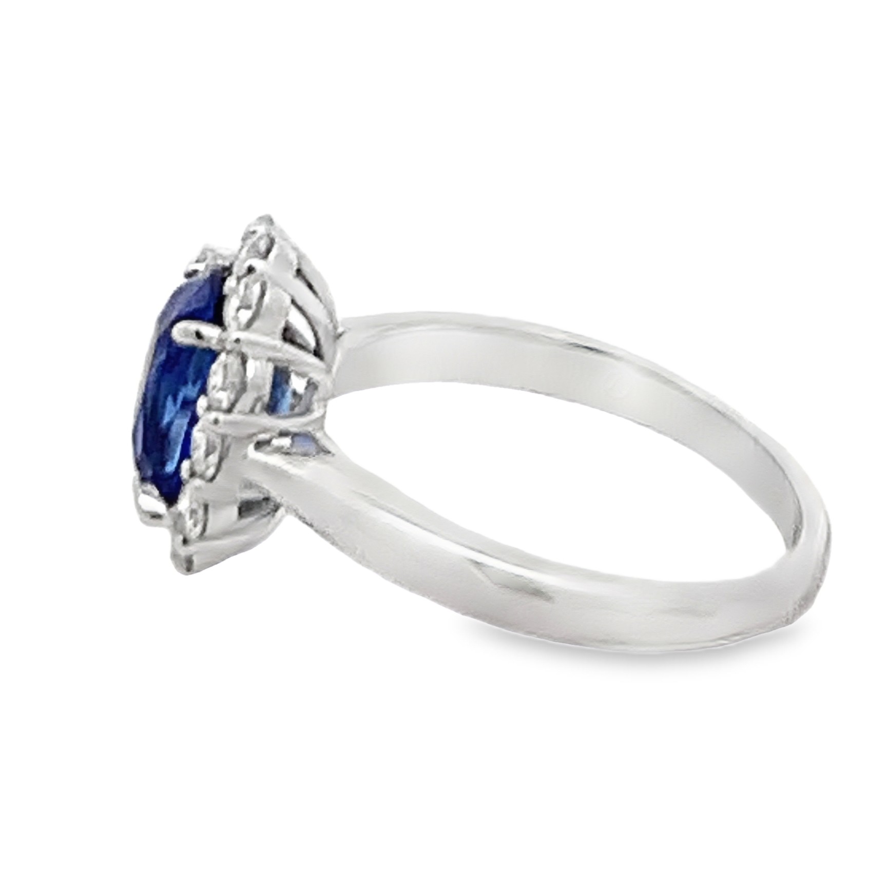 18K White Gold Sapphire and Diamond Halo Ring Size 6.25 with 1 Cushion Sapphire 2.70 CTW and 12 Round Cut Diamonds 0.56 CTW F-G VS