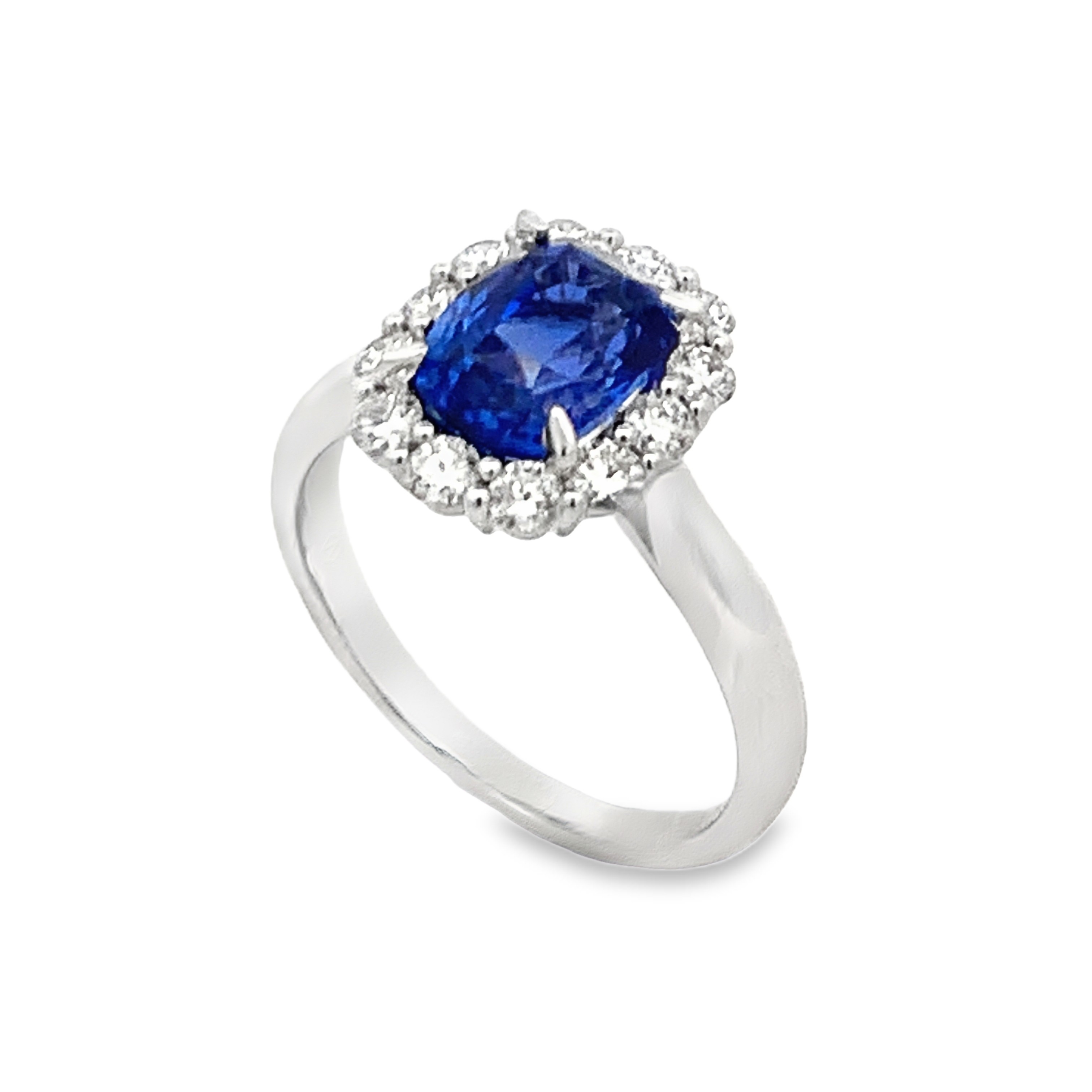 18K White Gold Sapphire and Diamond Halo Ring Size 6.25 with 1 Cushion Sapphire 2.70 CTW and 12 Round Cut Diamonds 0.56 CTW F-G VS