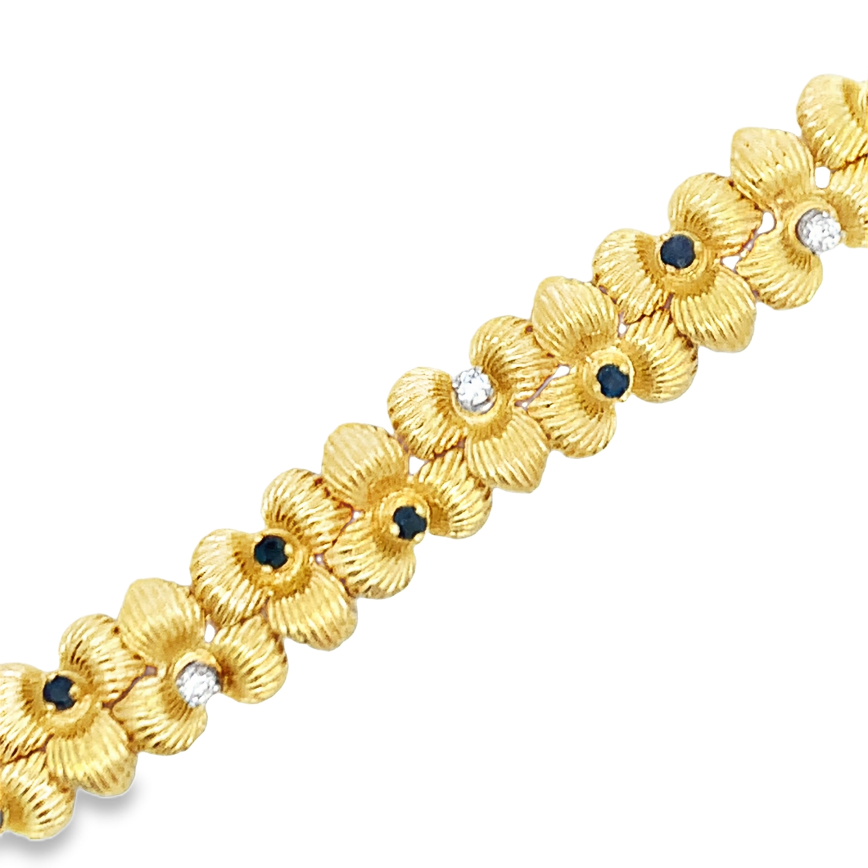 David Rovinsky 18 K Yellow Gold Sapphire and Diamond Floral Bracelet 6.75 with 12 Round Sapphires 1.00 CTW and 6 Round Diamonds 0.30 CTW I-J SI1-I1
25.3dwt