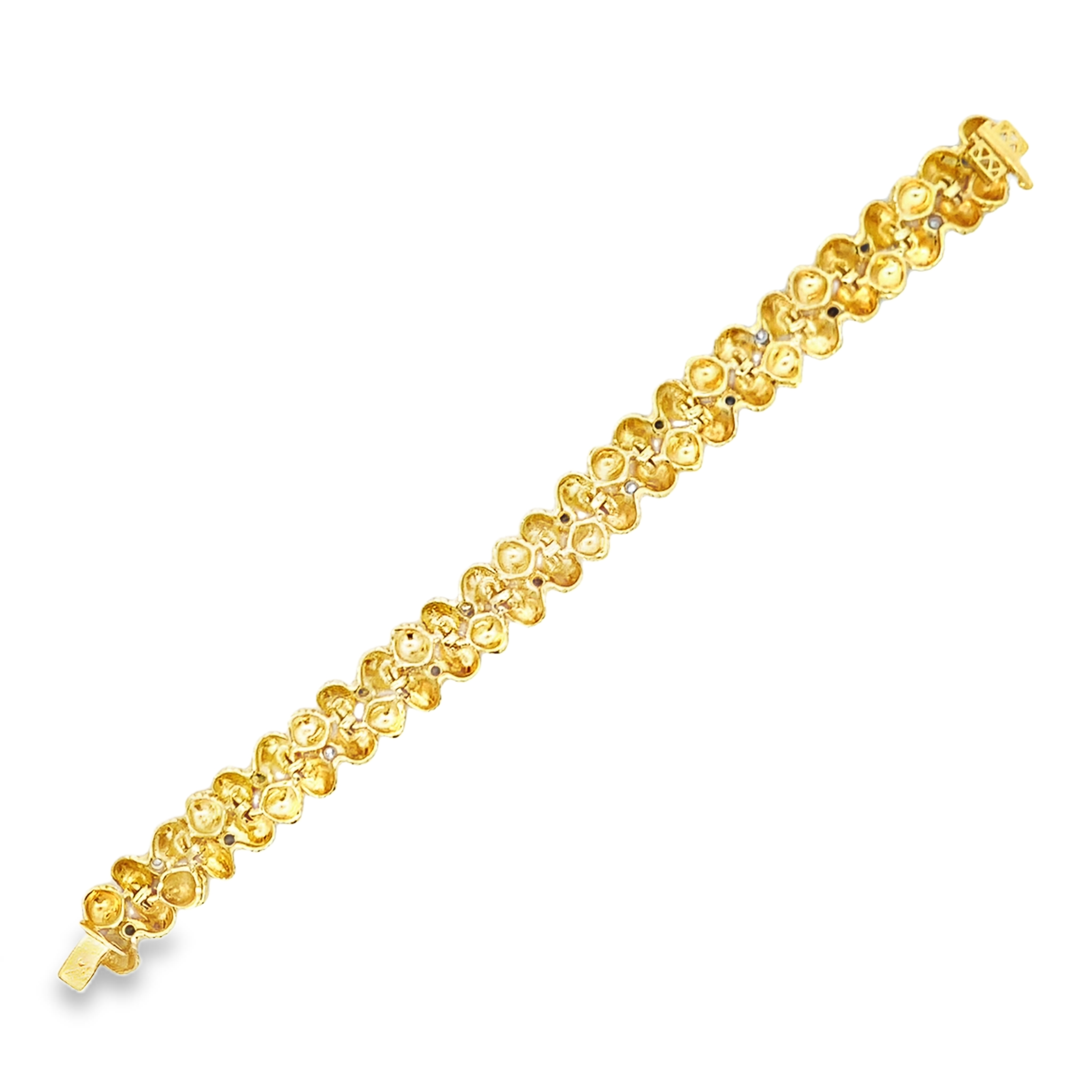 David Rovinsky 18 K Yellow Gold Sapphire and Diamond Floral Bracelet 6.75 with 12 Round Sapphires 1.00 CTW and 6 Round Diamonds 0.30 CTW I-J SI1-I1
25.3dwt