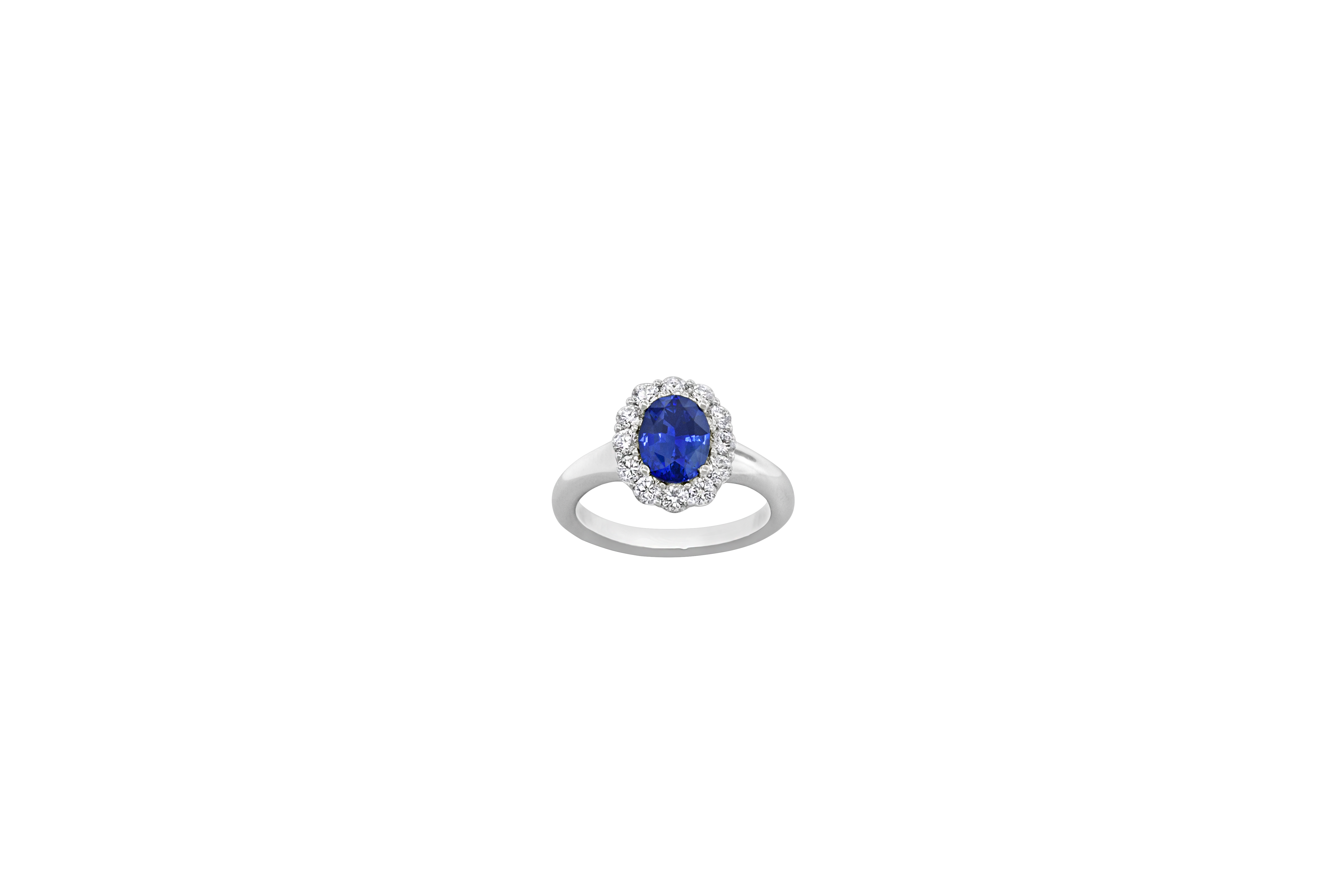 Blue Sapphire and 3/5ctw Diamond Halo Ring