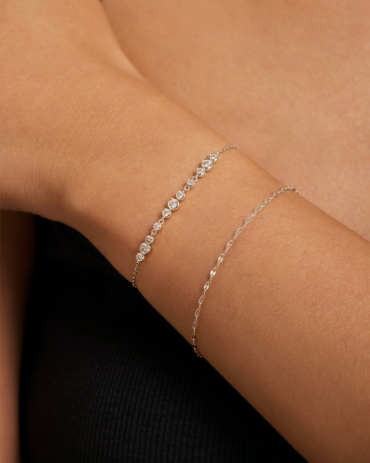 ANIA HAIE Sterling Silver and Graduated Bezel-set Zirconia Trios Bracelet l 7.25 inches